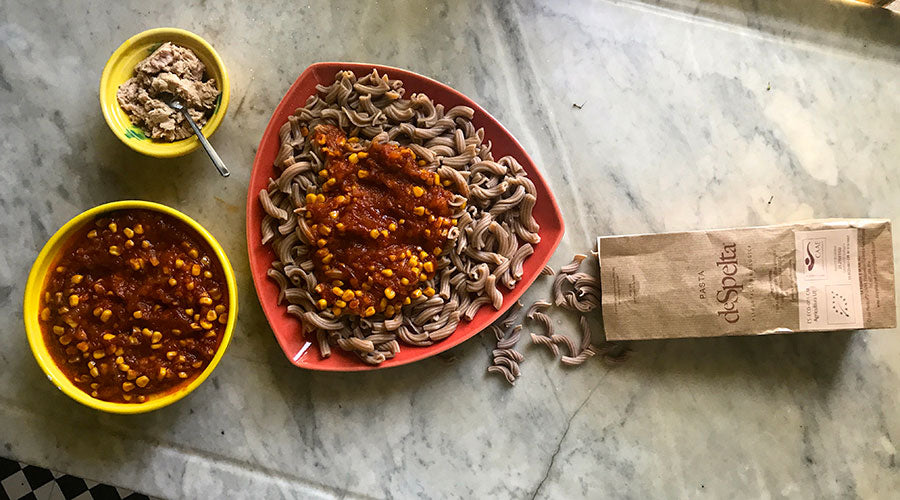Encebollado con maíz